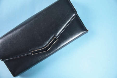 woman black wallet on the table background