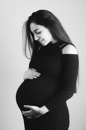 Pregnant woman hand on the belly.の写真素材