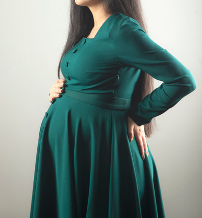 Pregnant woman hand on the belly.の写真素材