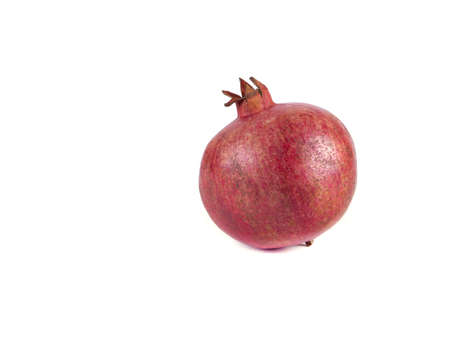 Fruit composition of pomegranate on a white background