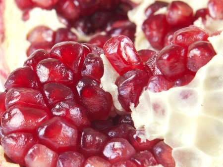 fruit composition from garnet berries on a white backgroundの写真素材