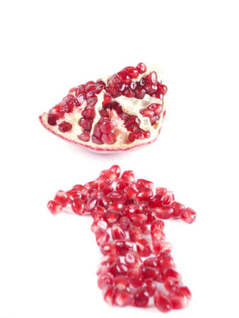 Fruit composition of pomegranate on a white backgroundの写真素材