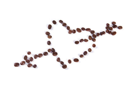 composition of coffee beans in the form of heart on a white backgroundの写真素材