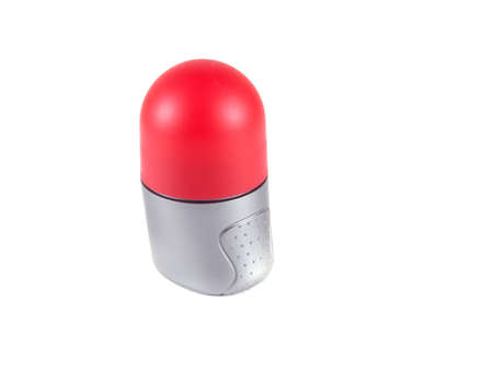 deodorant bottle with a red cover on a white backgroundの写真素材