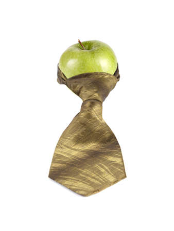 green apple in green tie on a white backgroundの写真素材
