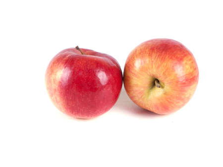Fruit composition of two red apples on a white backgroundの写真素材