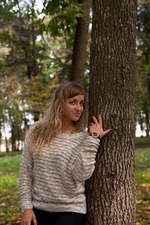 The white-haired young beautiful girl on a background of nature.の写真素材