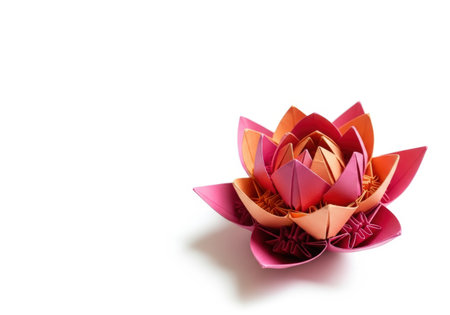 Paper origami flower isolated on white background. Clipping path included.の素材