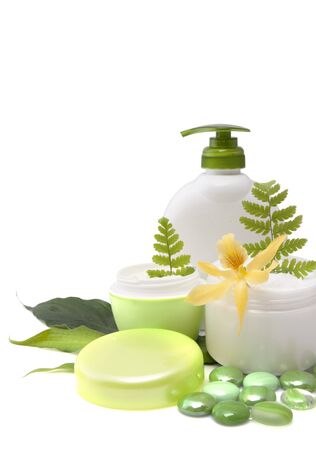Composition of cosmetic products with flower on white backgroundの写真素材