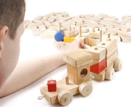 boy play with the wooden trainの写真素材