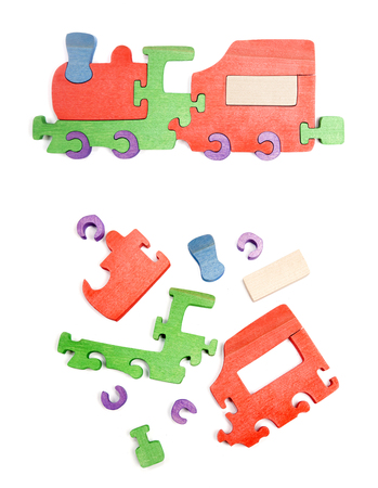 Wooden puzzle. Assembled and disassembled trainの写真素材