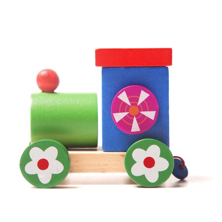 Wooden train puzzle on the whiteの写真素材