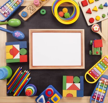 Color toys border on the black deskの写真素材