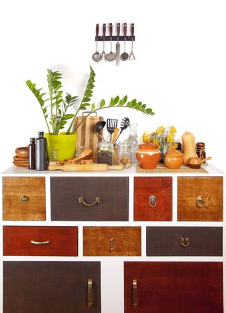 Chest of drawers on the kitchen on whiteの写真素材