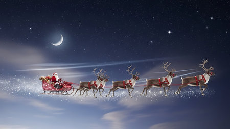 Santa Claus flying in a sleigh with reindeers and moonの素材