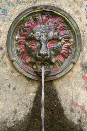 A tap dripping waterの写真素材