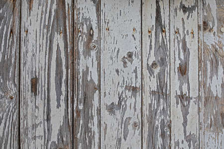 Texture background wooden wall weathered chipped white paintの写真素材