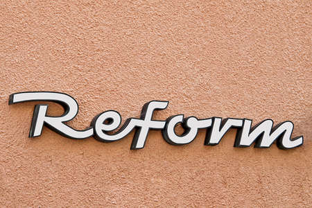 The word reform on a house wallの写真素材