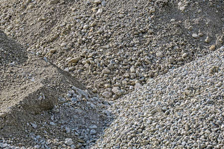 stones and pepples on a pile at a construction siteの写真素材