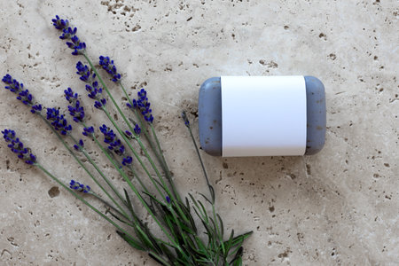 Lavender soap with unlabeled white banderole with fresh lavender flowersの写真素材