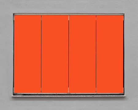 closeup of a modern, red window shutter