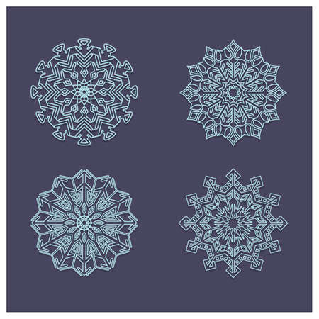 Set of four beautiful complex snowflake mandalasのイラスト素材