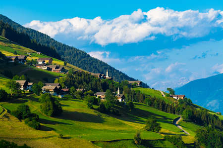 Typical alpine villages in tyrol alps on sunsetの写真素材