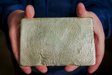 Just made gold ingot in the hands, Russia.のeditorial素材