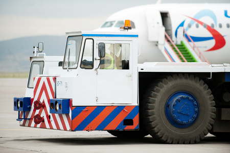 Tug pushback tractor in the airport in Russia.のeditorial素材
