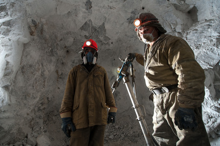 Russia - August 2014: Miner poses for a photograph inside a gold mine.のeditorial素材
