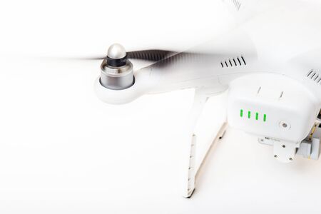 Engine and propeller of a drone isolated on white background