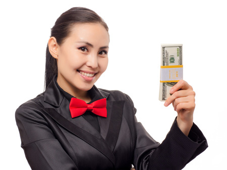 Young asian businesswoman with money on white backgroundの写真素材