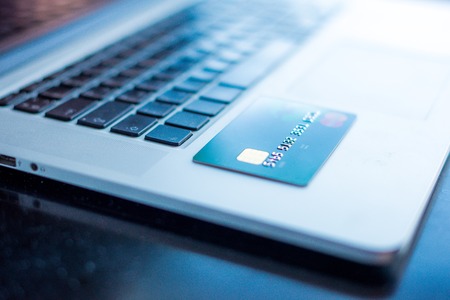 Close up of a bank card. Making online payments