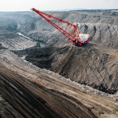 Dragline on open pit coal mine in Russia