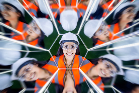 Portait of a beautiful young asian female worker in mirrow reflection
