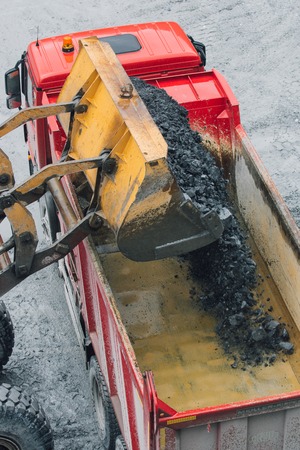 Truck loading with ground at a gold mining factory