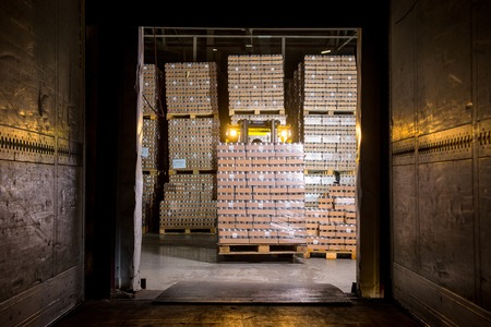 loading empty truck with goods from a storageの写真素材