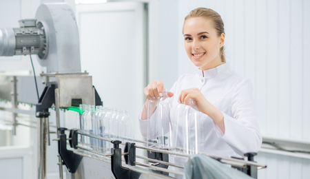 Worker at a water lineの写真素材