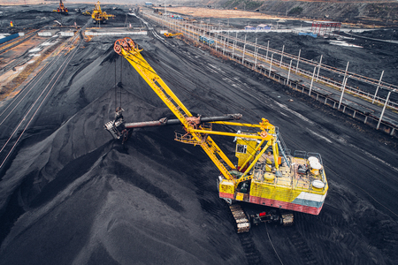 Coal mining at an open pit from above.の写真素材