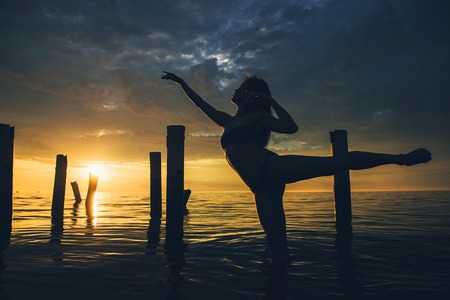 dancer water sunsetの写真素材