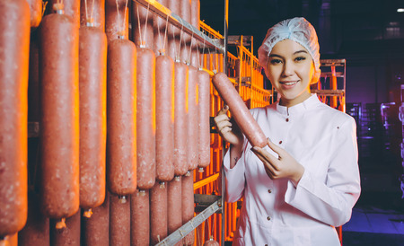 sausage meat factory production workerの写真素材