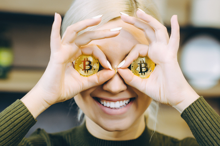 woman bitcoin laptop