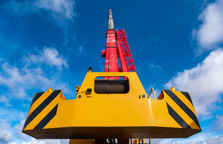 blue sky construction crane big yellow redの写真素材