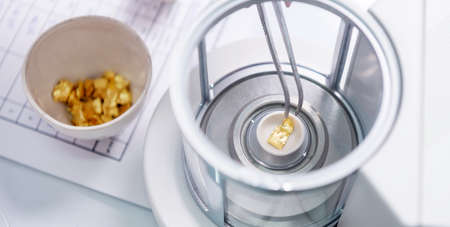 laboratory gold weights pure mining metal researchの写真素材