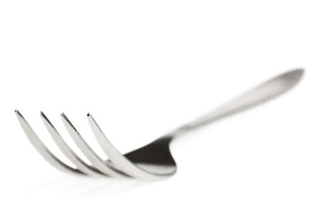 Macro view of fork over white backgroundの写真素材