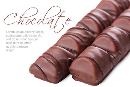 Closeup view of chocolate bar over white backgroundの写真素材