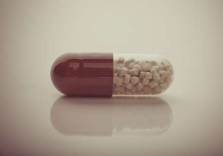 Macro view of capsule with pills  Toning imageの写真素材