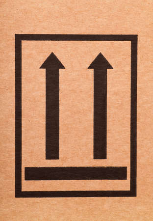  This side up  sign on a cardboard boxの写真素材
