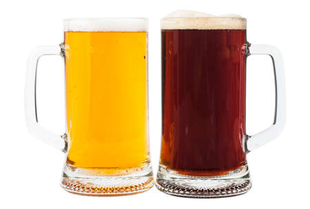 Light and brown beer in two glasses isolated over white backgroundの写真素材