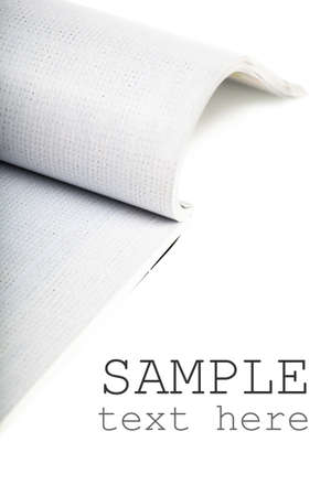 Selective focus image of magazine over white backgroundの写真素材